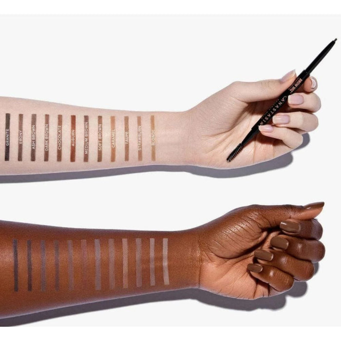 Brow wiz swatches on two different arm shades with one holding a brow wiz