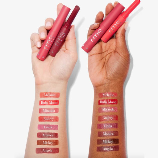 RMS Beauty Legendary Serum Lipstick  in 2 different skin toned hands with arm swatches of colors 