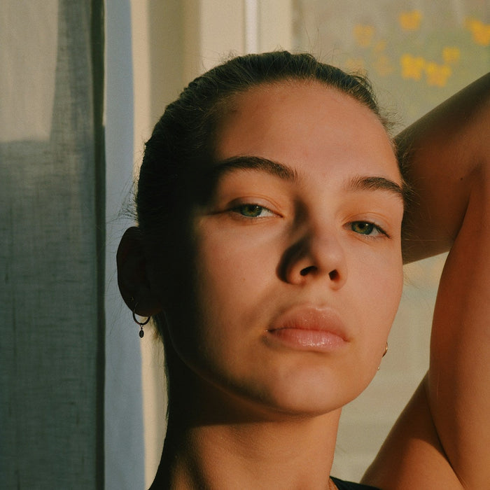 Women Showing Her Glowing Face