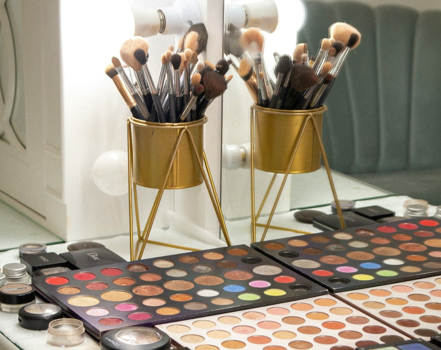 Makeup products spread out on a table