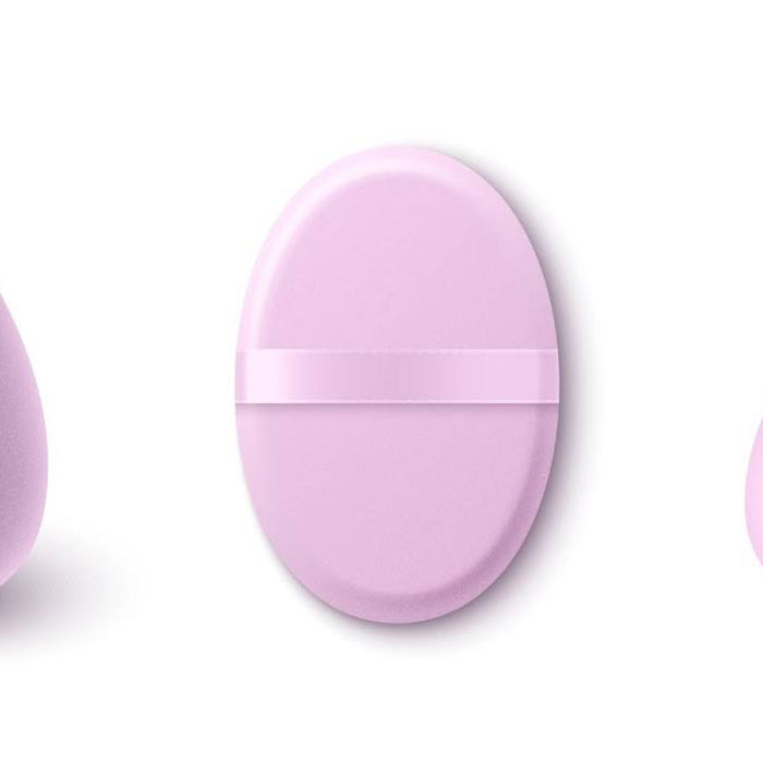 Pink makeup sponges in three different shapes displayed on a white background