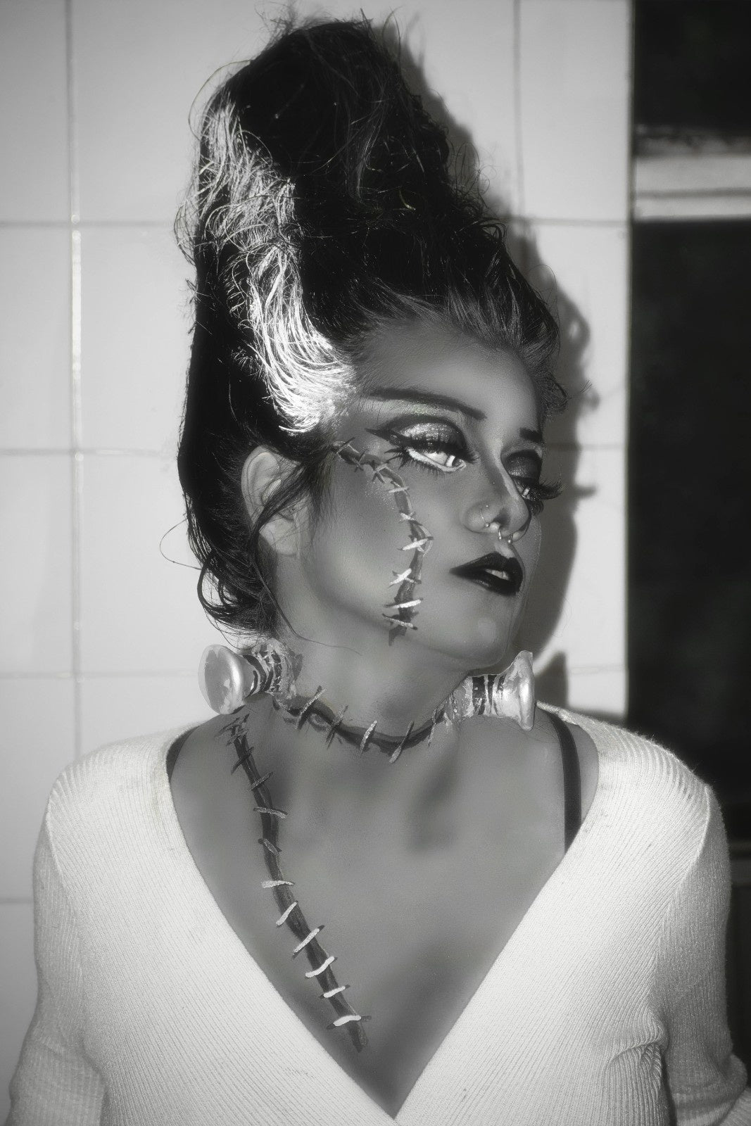 A woman dressed as the Bride of Frankenstein for Halloween