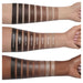 Anastasia Beverly Hills Smooth Blur Contour Stick swatches on the arms of light, medium and dark skin tones. 