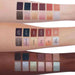 Anastasia Beverly Hills Cosmos Eyeshadow Palette swatches on the arms of different skin tones. Center arm includes names over top of the swatches