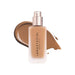Anastasia Beverly Hills Impeccable Blurring Second-Skin Matte Foundation Bottle 5W with swatch behind