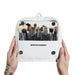 Artist Kit Company Brush Bag Large held up with two hands by the sides.