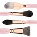 Bdellium Pink Golden Triangle Face Set sideways and stylized