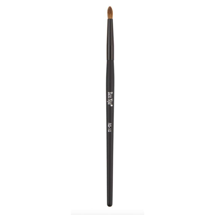 Ben Nye RS-10 fine makeup brush with rounded tapered bristles, designed for blending, shading, and detailed creme or powder application.