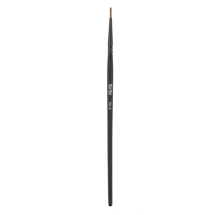 Ben Nye RS-2 fine detail brush featuring a small tapered tip for precision makeup application, line work, and controlled blending.