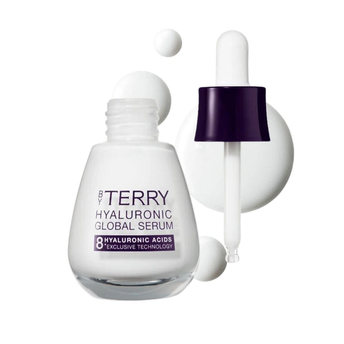 By Terry Hyaluronic Global Serum 1.01oz open with drops of product behind