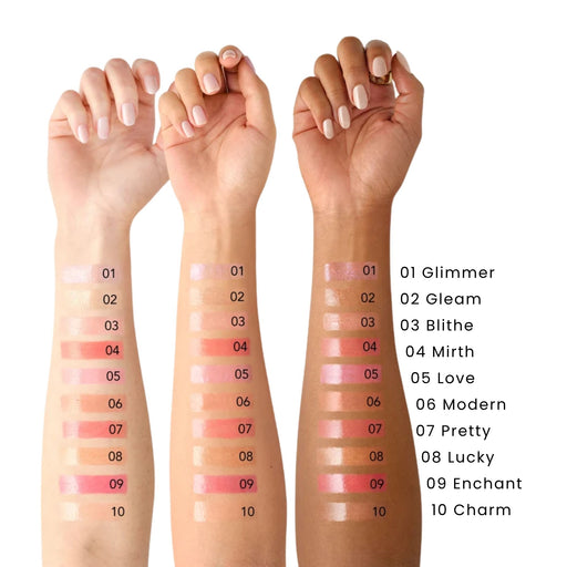 Chantecaille Brilliant Gloss swatches on arm. 