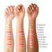 Chantecaille Brilliant Gloss swatches on arm. 