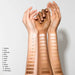 Chantecaille Just Skin arm swatches on 3 different skin tones
