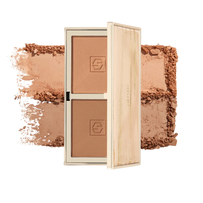 Jouer Sunswept Bronzer Dual Bronzer Palette Light to Medium with swatch behind product.