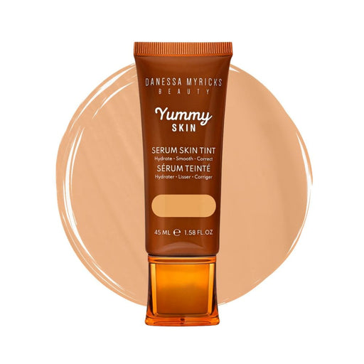 Danessa Myricks Yummy Skin Serum Skin Tint 4 with Swatch behind product