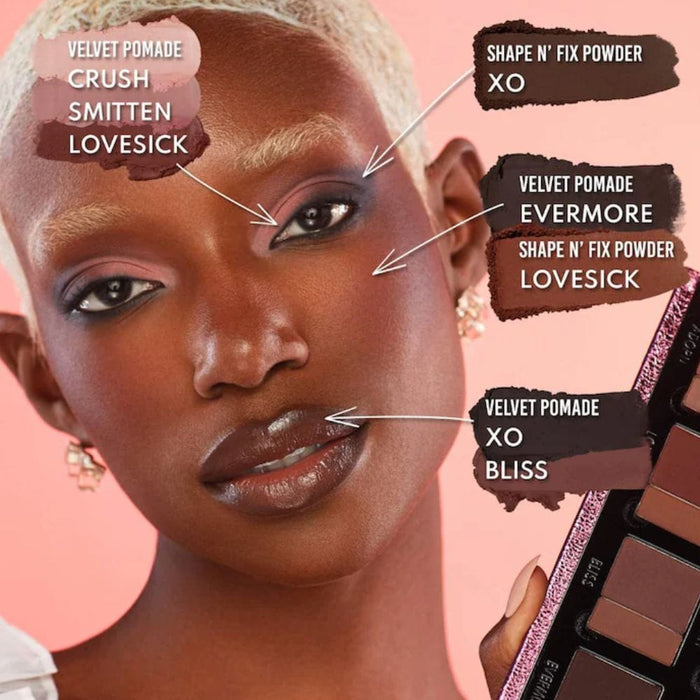 Deep skin toned model with palette shades applied to her face