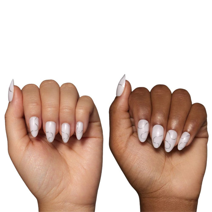 Glamnetic Press-On Nails Silent Night applied on the nails of light and dark skin hands