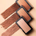 Kevyn Aucoin The Neo-Bronzers  open compacts with finely crushed powder swatches 
