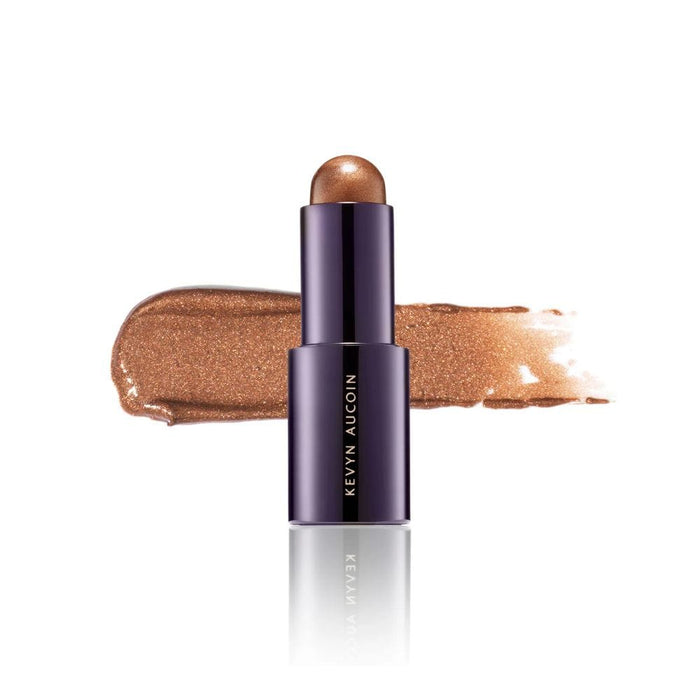 Kevyn Aucoin The Lighting Stick Warm Light with Swatch behind product