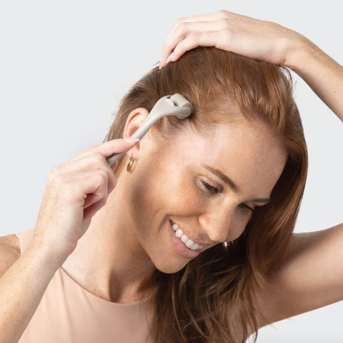 Kitsch Micro Derma Roller – Warm Gray being used by model