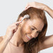 Kitsch Micro Derma Roller – Warm Gray being used by model