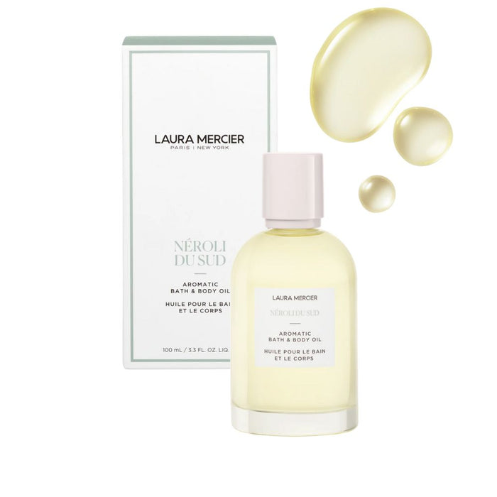 Laura Mercier Aromatic Bath & Body Oil 3.3oz Néroli du Sud bottle in front of product box with swatch above and to the right.