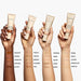 Laura Mercier Tinted Moisturizer Natural Skin Perfector SPF 30 swatches on arms from dark to light