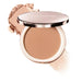 Laura Mercier Tinted Blur Balm Skin Tint 02 with swatch behind open compact