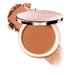 Laura Mercier Tinted Blur Balm Skin Tint 04 with swatch behind open compact