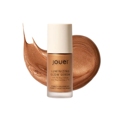 Jouer Luminizing glow serum 1oz bottle with nude glow swatch behind product.