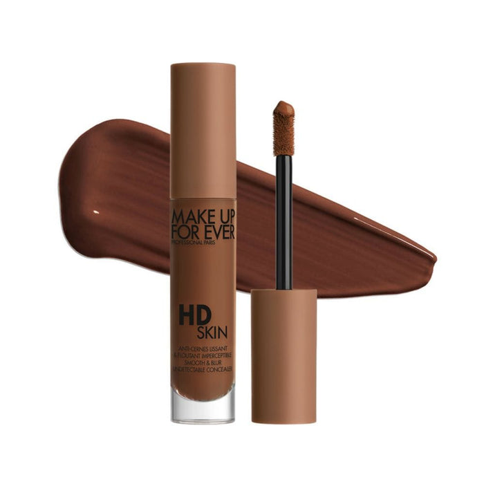 MUFE HD Skin Concealer 4.4N Ebony with Swatch behind product
