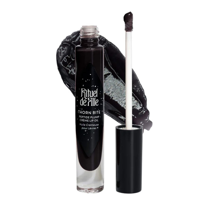 Rituel De Fille Thorn Bite Peptide Plump Creme Lip Oil Black Thorn with swatch