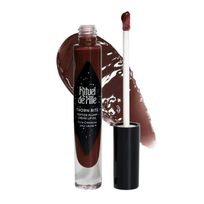 Rituel De Fille Thorn Bite Peptide Plump Creme Lip Oil Blood Thorn with swatch