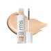 RMS Revitalize Hydra Concealer with swatch behind product against white background.