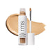 RMS Revitalize Hydra Concealer with swatch behind product against white background.