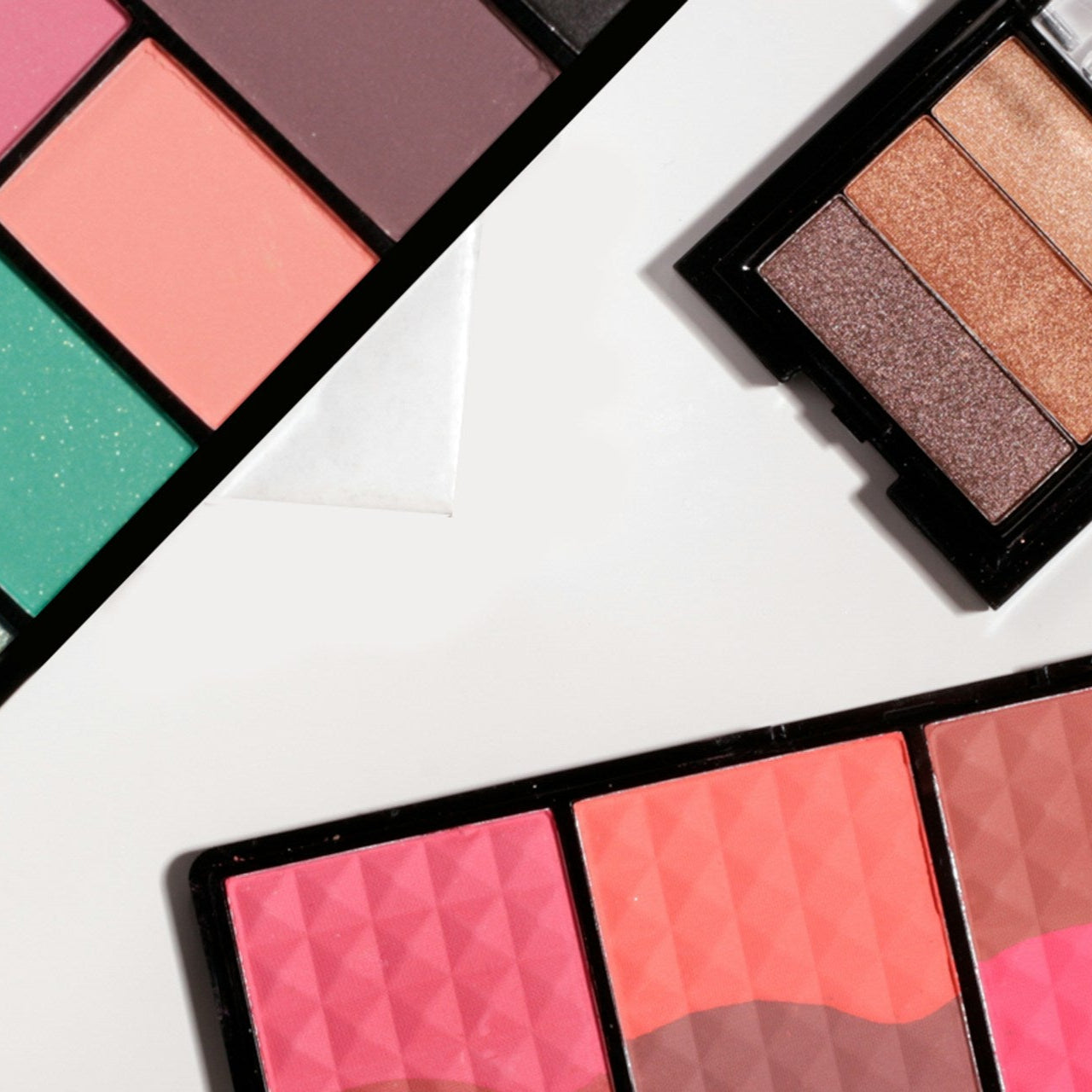 Colorful palettes of varying sizes on a white surface