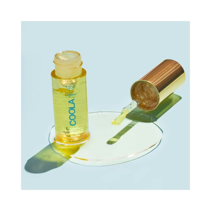Coola Liplux Hydrating Oil Golden Glow Stylized
