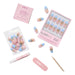 Glamnetic Press-On Nails Spirited Sky kit contents spread across a white background