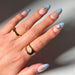 Glamnetic Press-On Nails Spirited Sky styled on model's hand