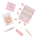 Glamnetic Press-On Nails Limonata kit contents spread across a white background