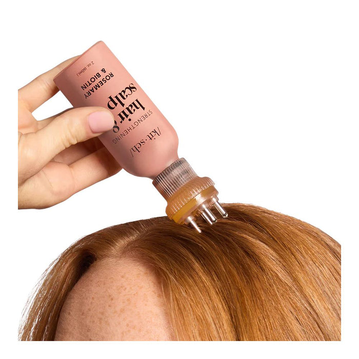 Kitsch Scalp & Hair Oil Applicator in use on top of scalp