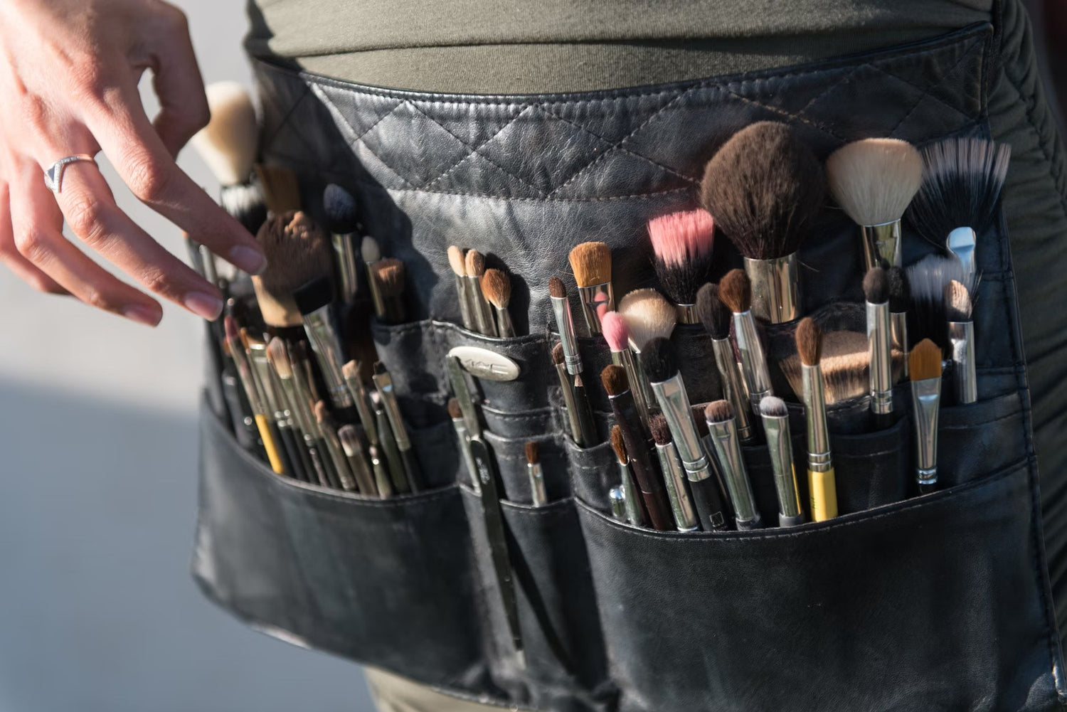 a makeup artist’s tool belt