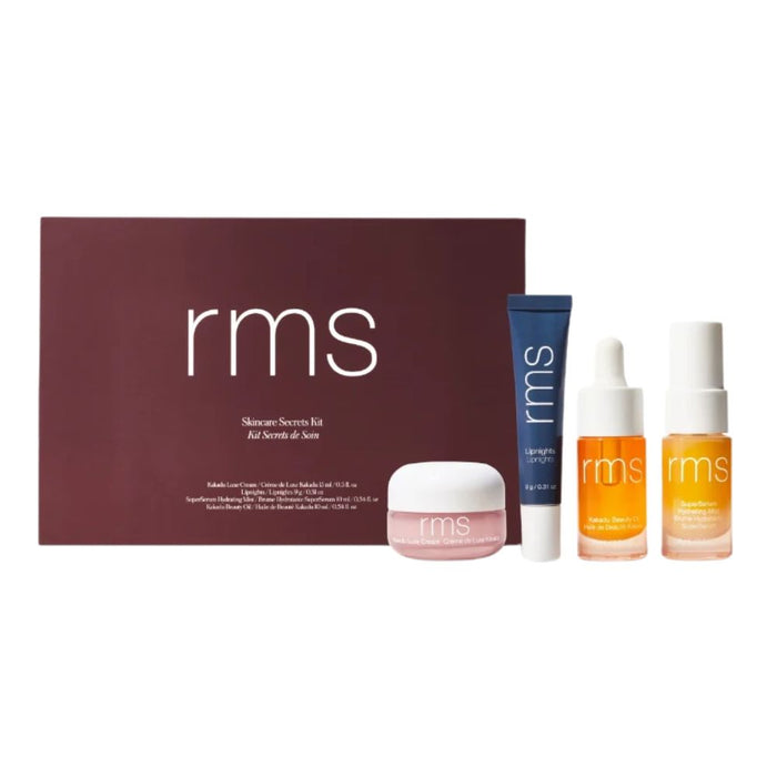 RMS Skincare Secrets Kit box with contents in front to the right