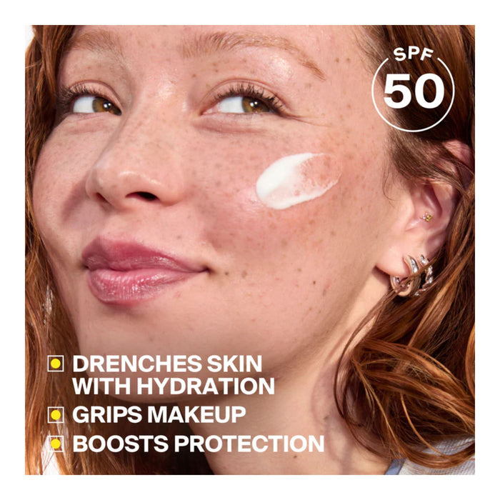 Supergoop! Dewscreen Hydrating Primer SPF 50 key use benefits text. Model with product swatch on cheekbone